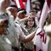 Boy scouts stand and salute during the Arborcrest Memorial Day Observance on Sunday, May 26. Daniel Brenner I AnnArbor.com